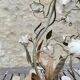 Italian cage chandelier decorated with ceramic roses and glass paste pendants