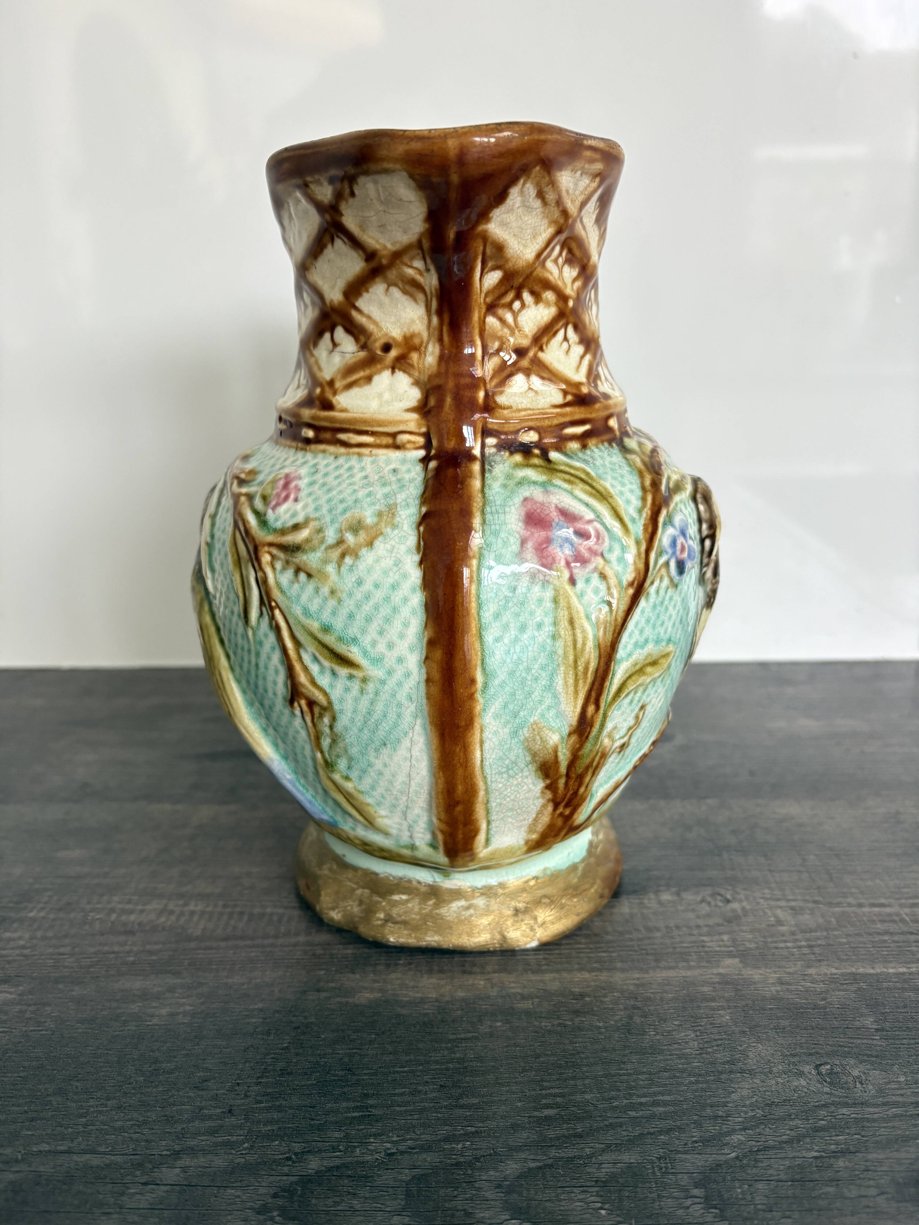 Pichet barbotine 19th century with bird decoration.