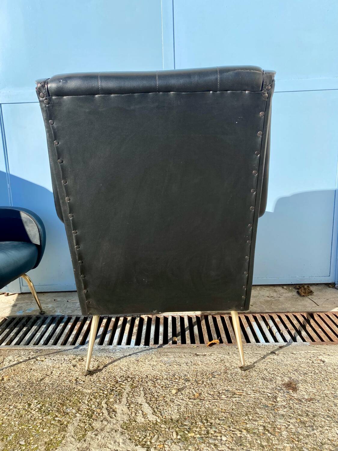 2 vintage faux leather armchairs