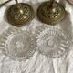 Pair of openwork brass candlesticks and glass bobeches