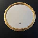 Round golden mirror