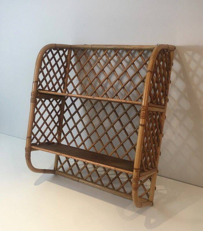 Rattan wall shelf. Attributed to Audoux-Minet