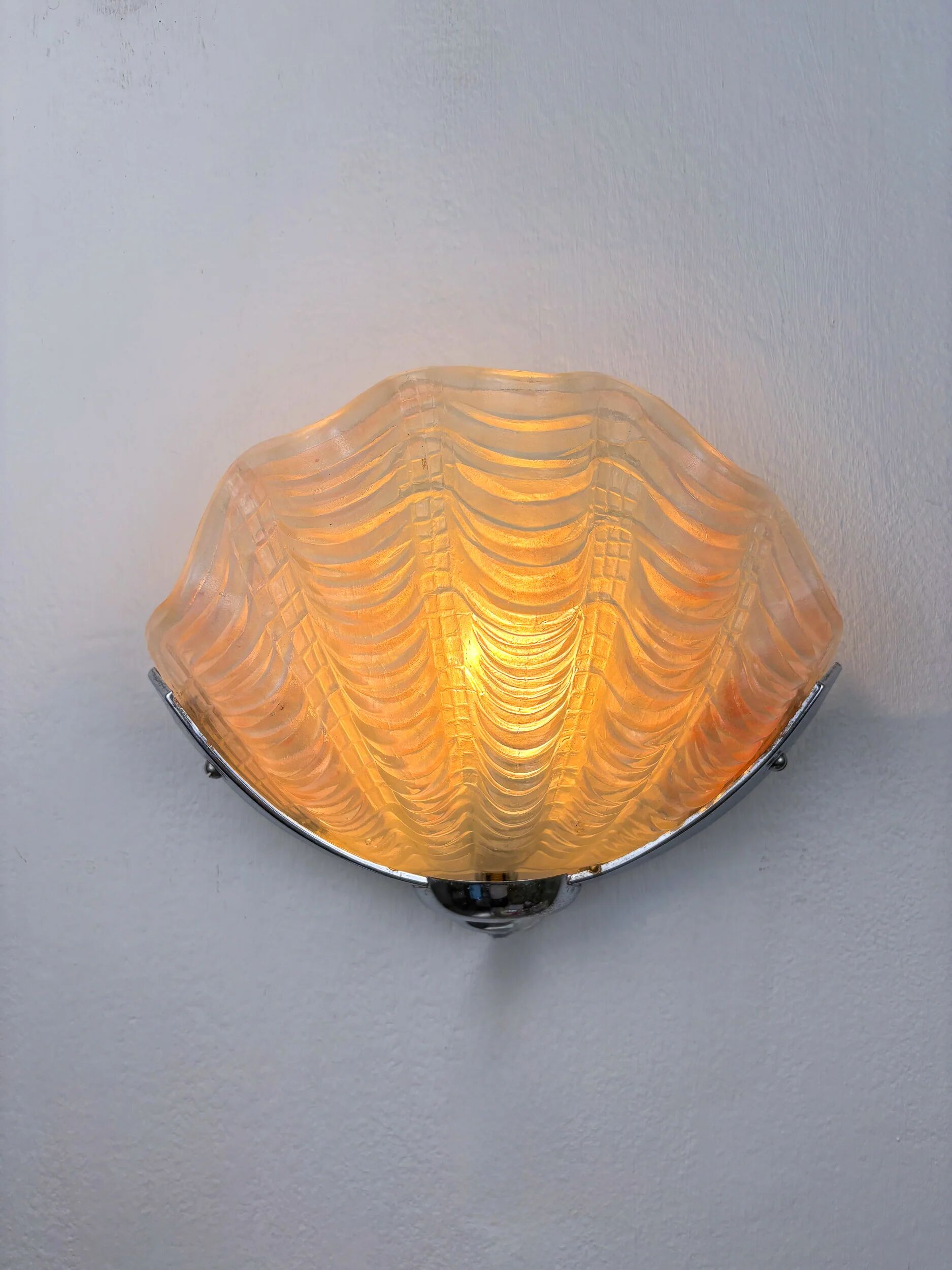 French Art Deco shell wall sconce – amber glass, 1960s