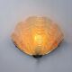 French Art Deco shell wall sconce – amber glass, 1960s