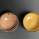 Vintage, two flamed stoneware bowls from the 20th century.
