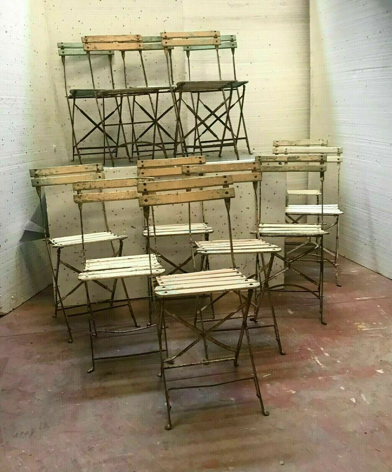 Folding chairs in iron and wooden blade XX century