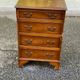 2 English wooden chests of drawers with 4 drawers