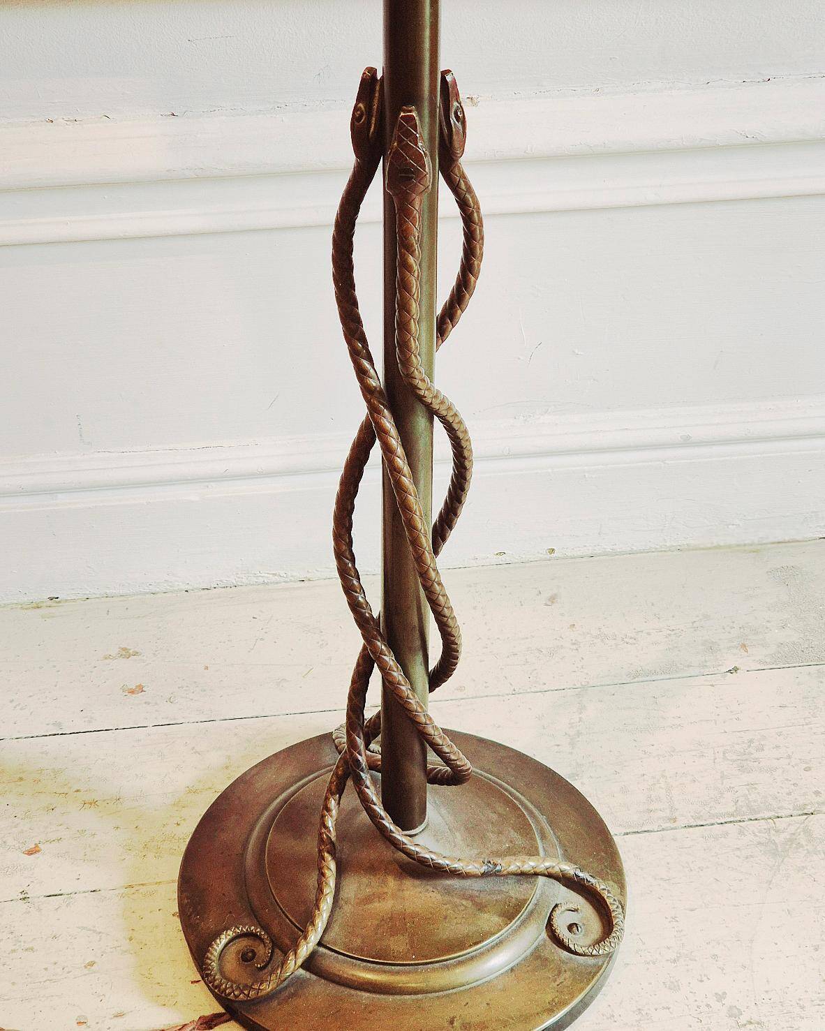 Rare and exquisite bronze floor lamp with intertwined snakes, early 1900s.