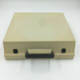 WE typewriter orange