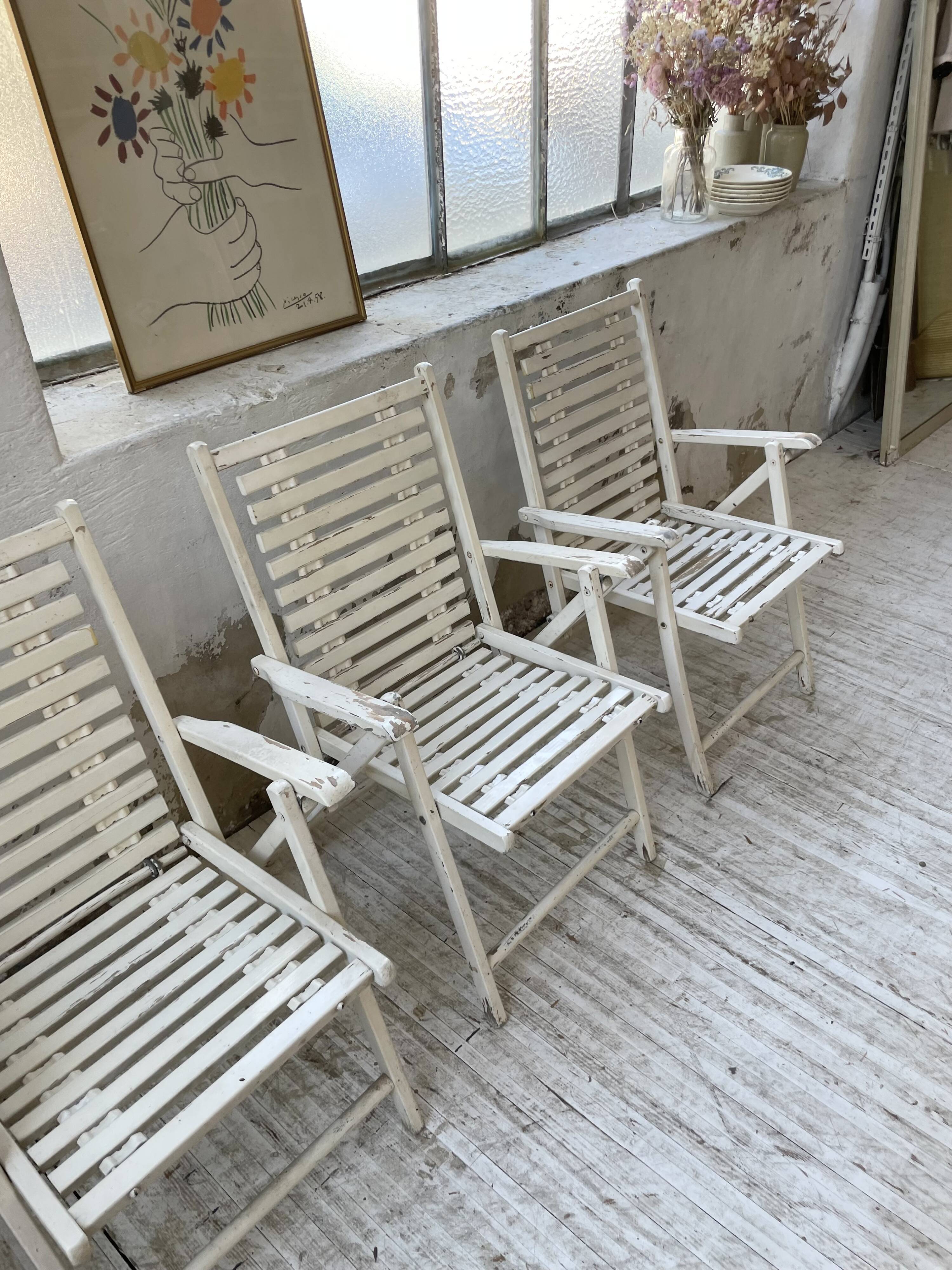 4 white wooden garden chairs