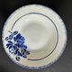 Set of 9 vintage deep plates with blue patterns.