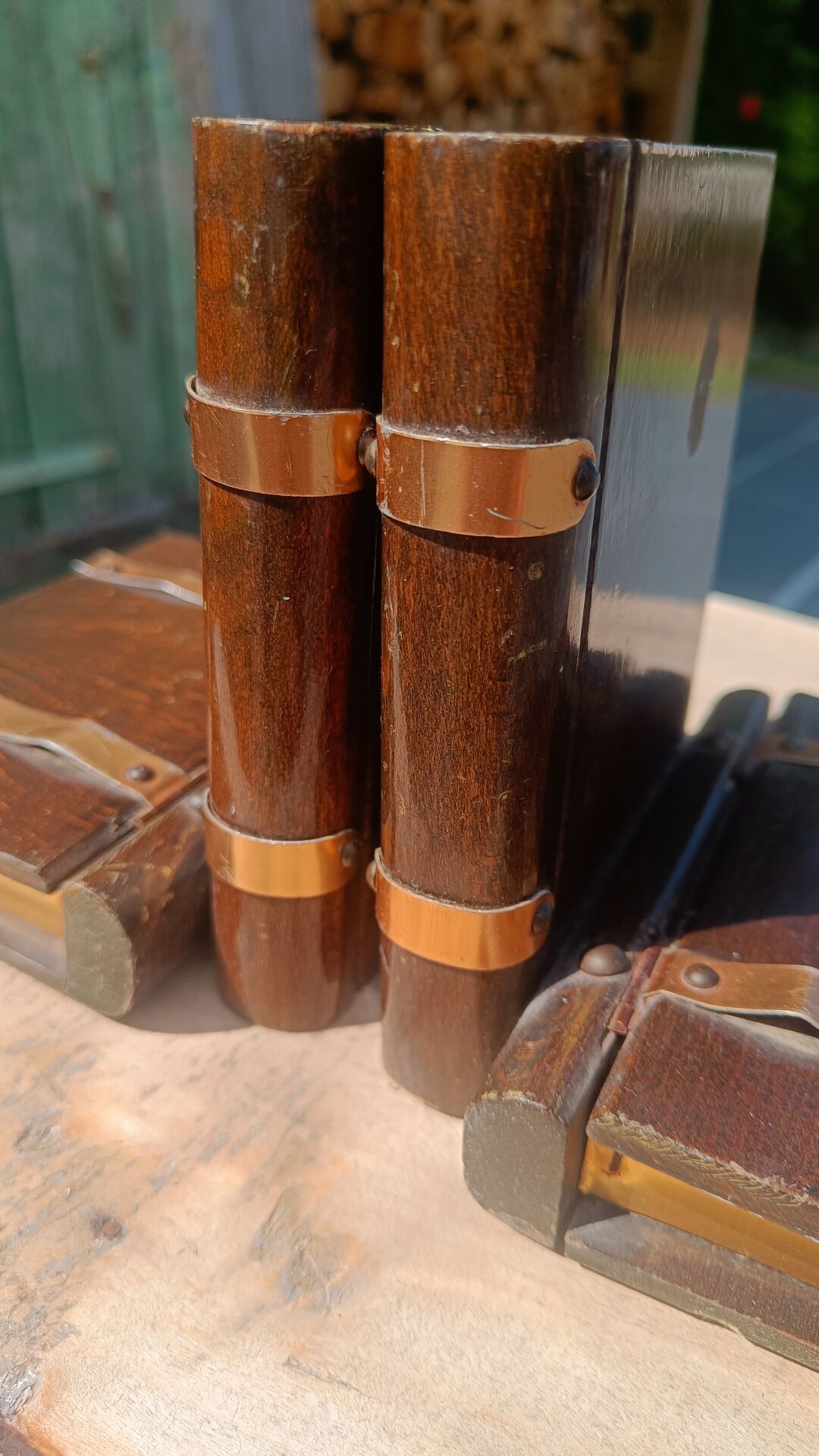 Wooden trompe-l'œil bookends with a book and box