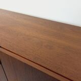 High Scandinavian modernist vintage sideboard in teak and black metal.