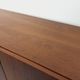 High Scandinavian modernist vintage sideboard in teak and black metal.