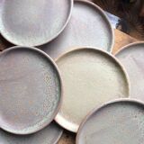 Set of 12 large and 11 small sandstone plates