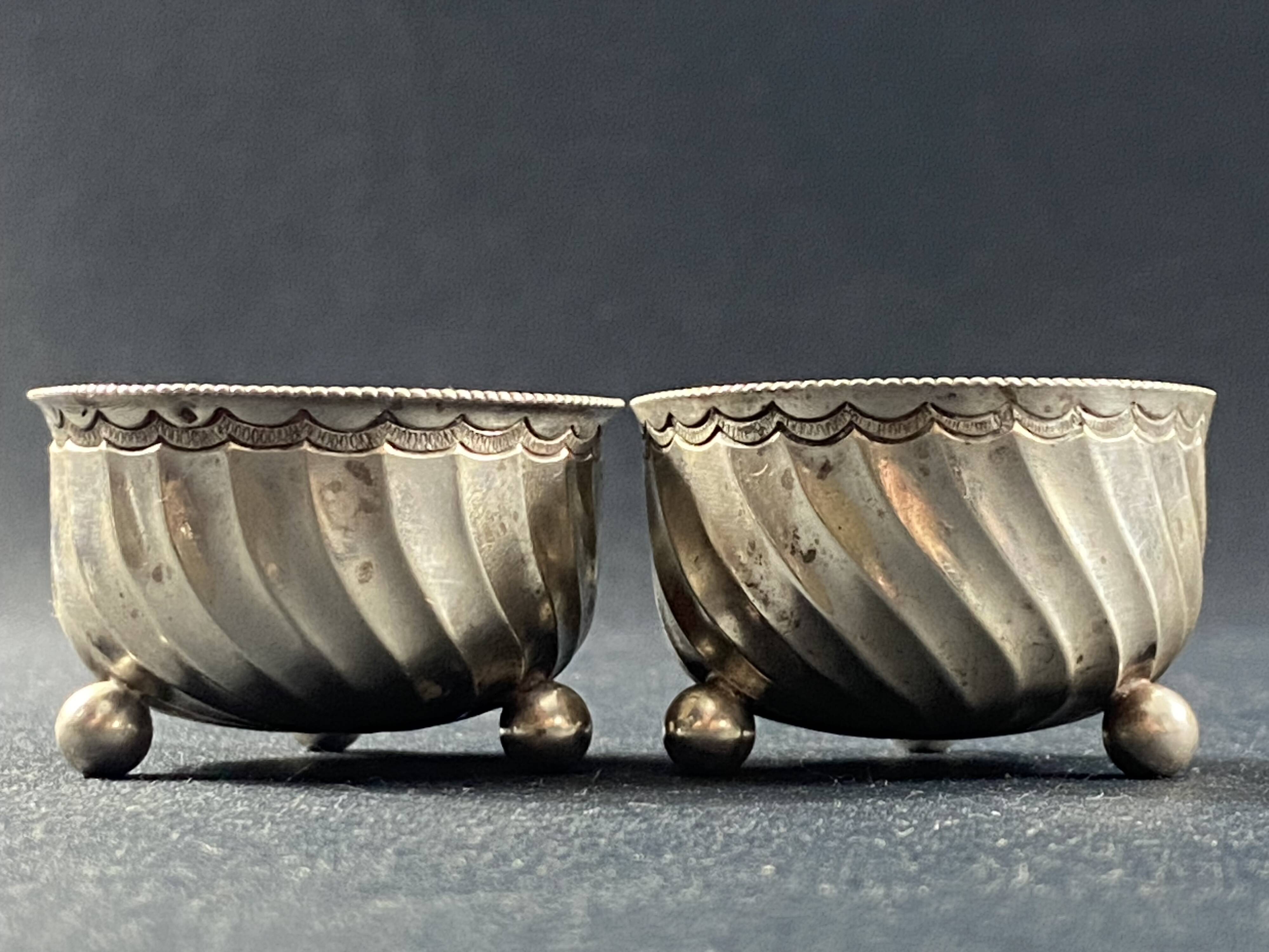 Pair of solid silver salt cellars with weevil hallmark