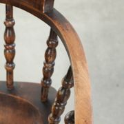 Wooden English antique pub/captain chair from the late 19th century