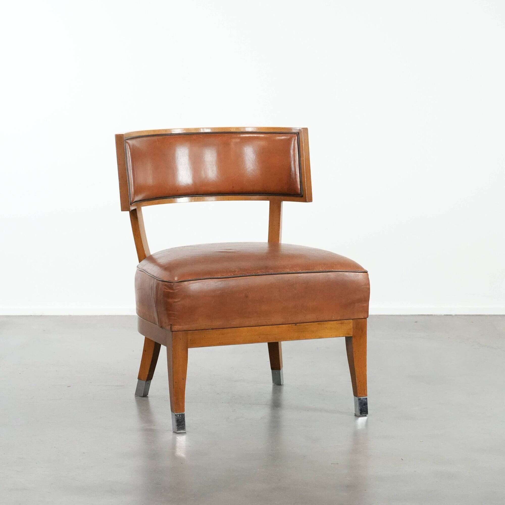 Vintage design armchair / cocktail chair made of sheepskin leather