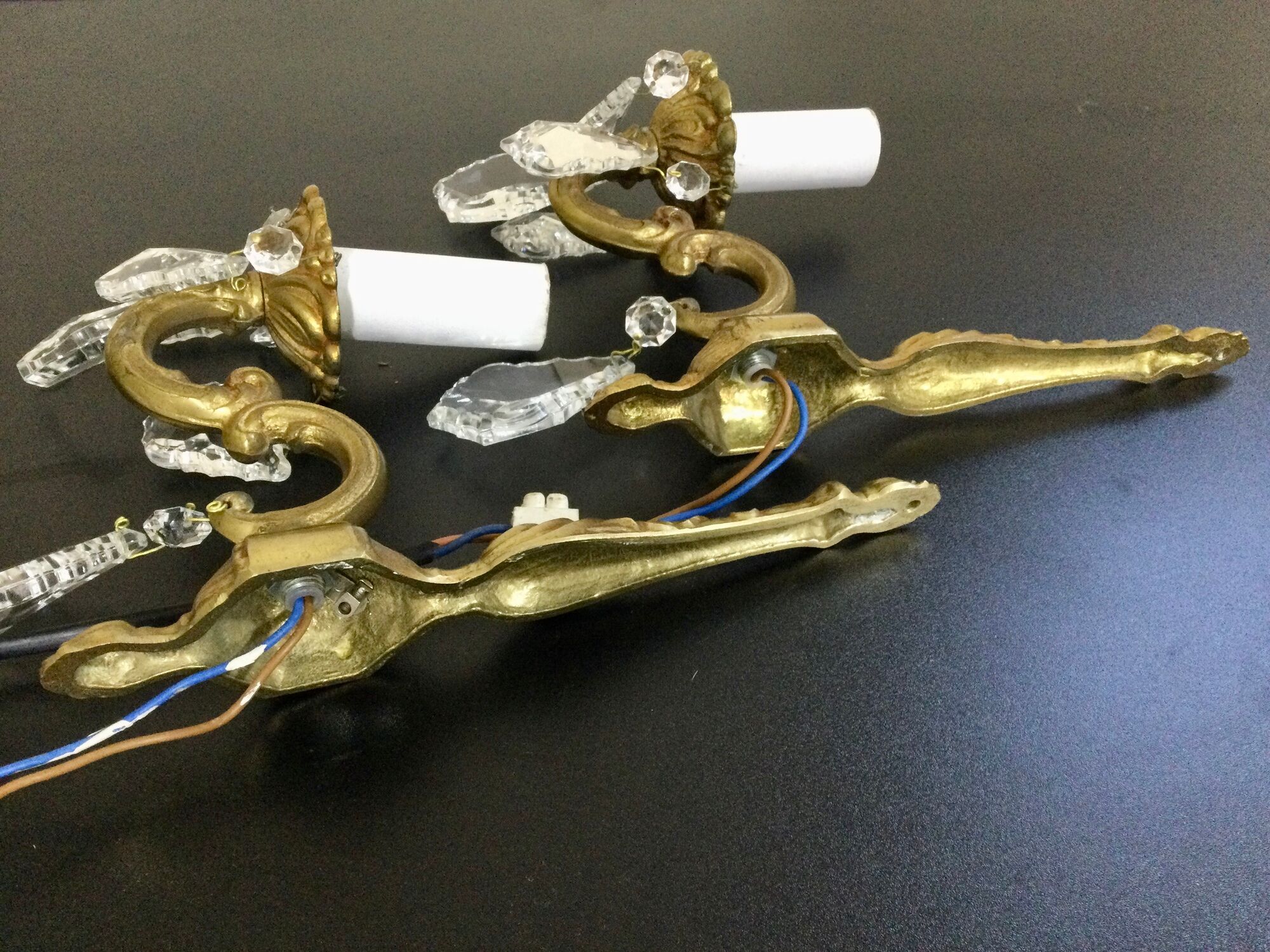 Pair of 1-light bronze sconces and Louis XV style stamps