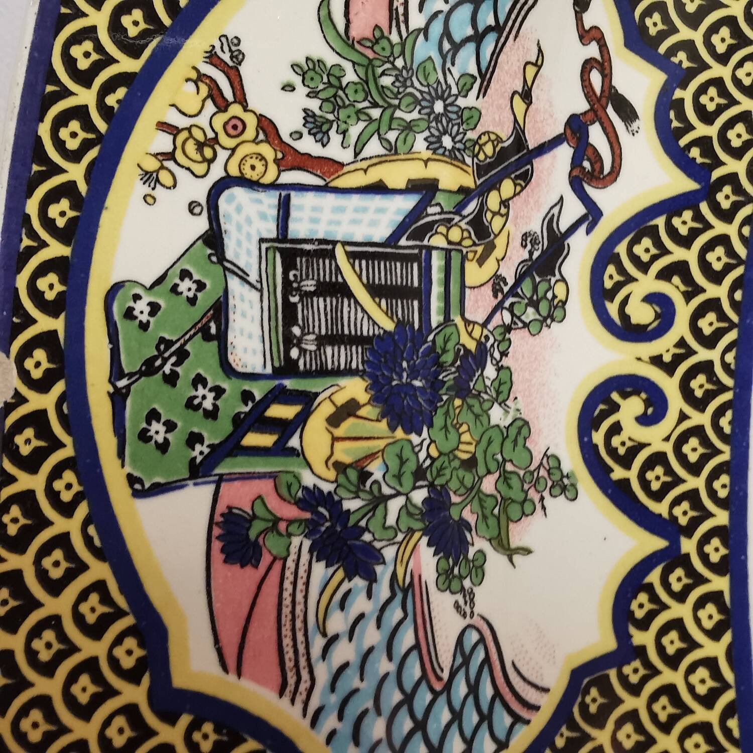 Ceramic dish decorated with peacock folk art Asian motif