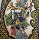 Ceramic dish decorated with peacock folk art Asian motif