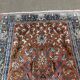 Handmade wool Iranian carpet - 1.65m x 1.07m.