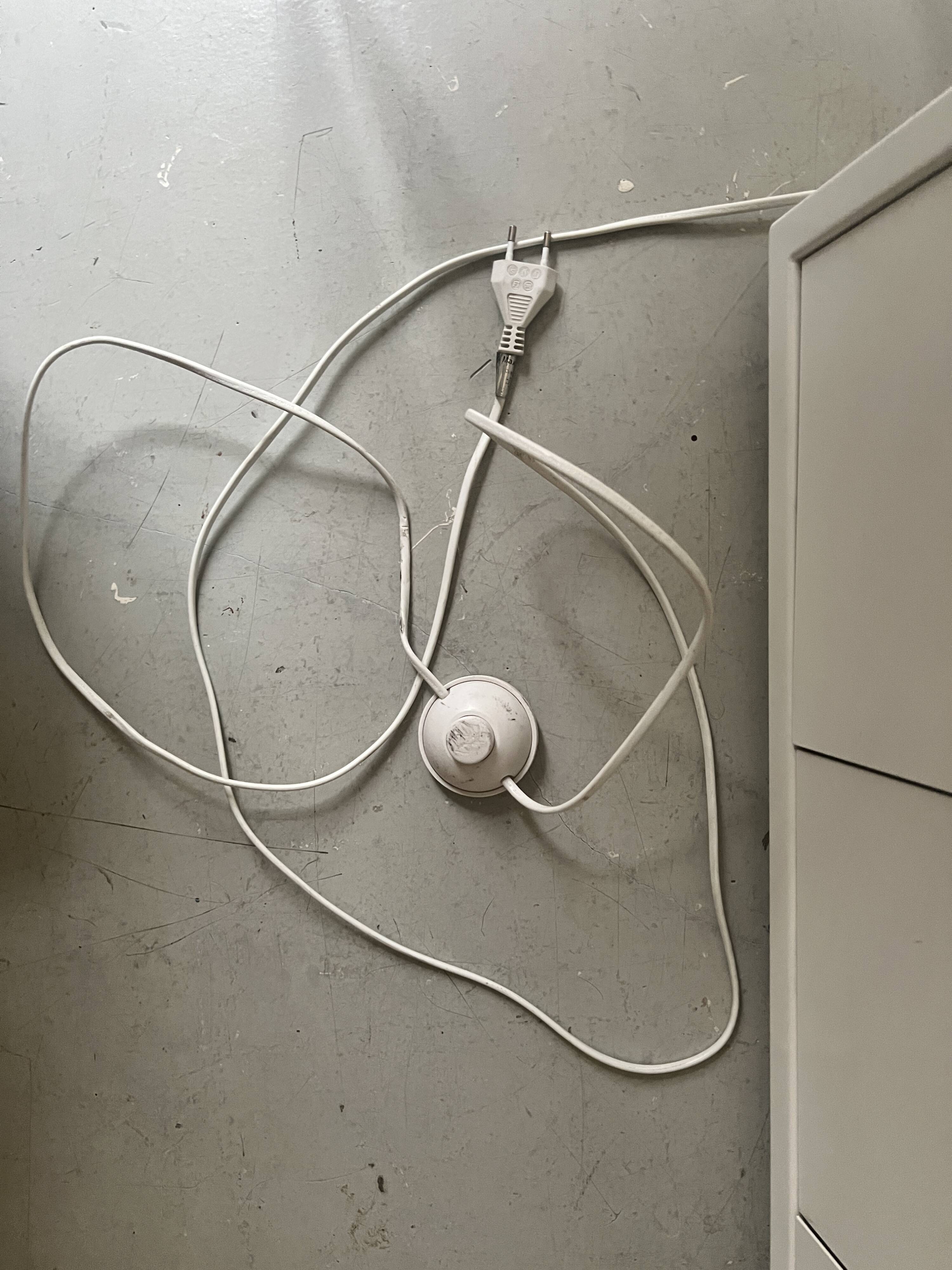 Modernist wall lamp with white metal shade, design by C. Grandidier.