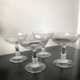 4 glasses of carved crystal champagne