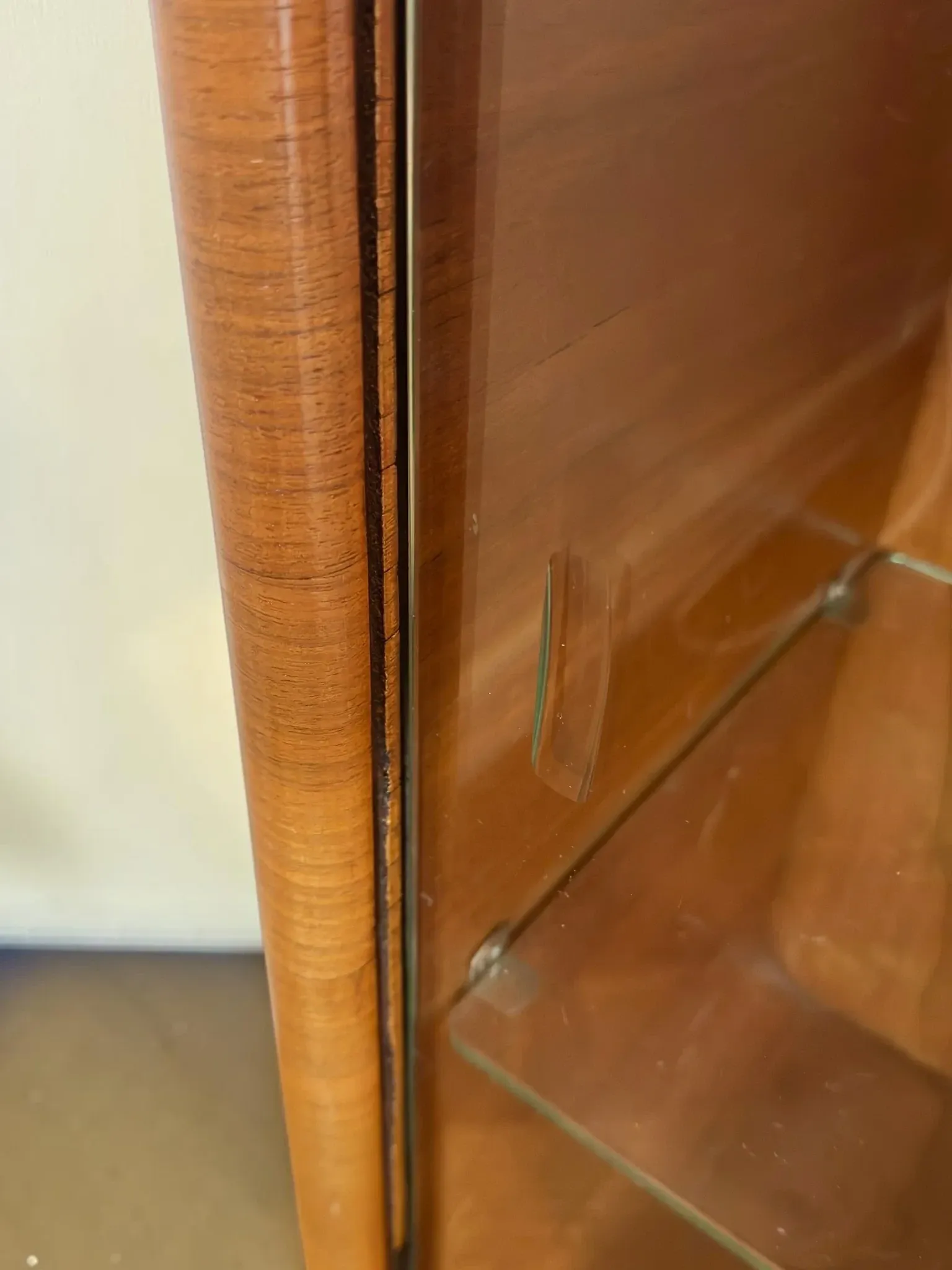 Vintage Art Deco display cabinet in mahogany with a black marble top.