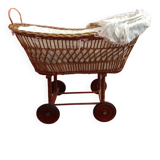 Vintage 1970s wicker cradle on wheels