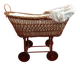Vintage 1970s wicker cradle on wheels