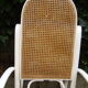 Antique caned rocking chair
