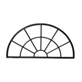 Old arched anthracite grey window