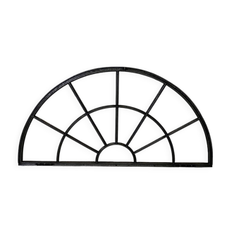 Old arched anthracite grey window