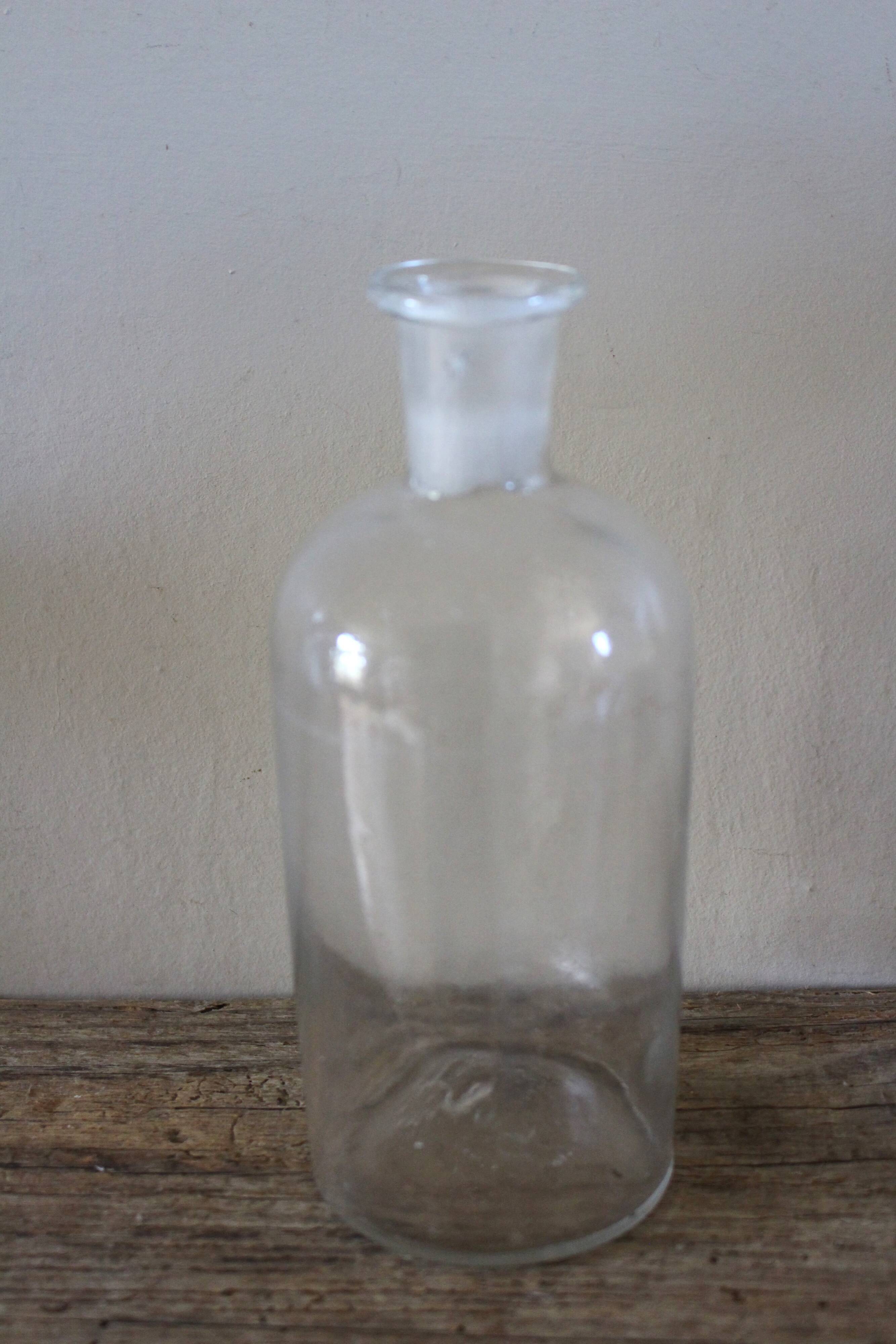 Clear glass bottle vase 500
