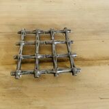Silver metal table mat imitating bamboo