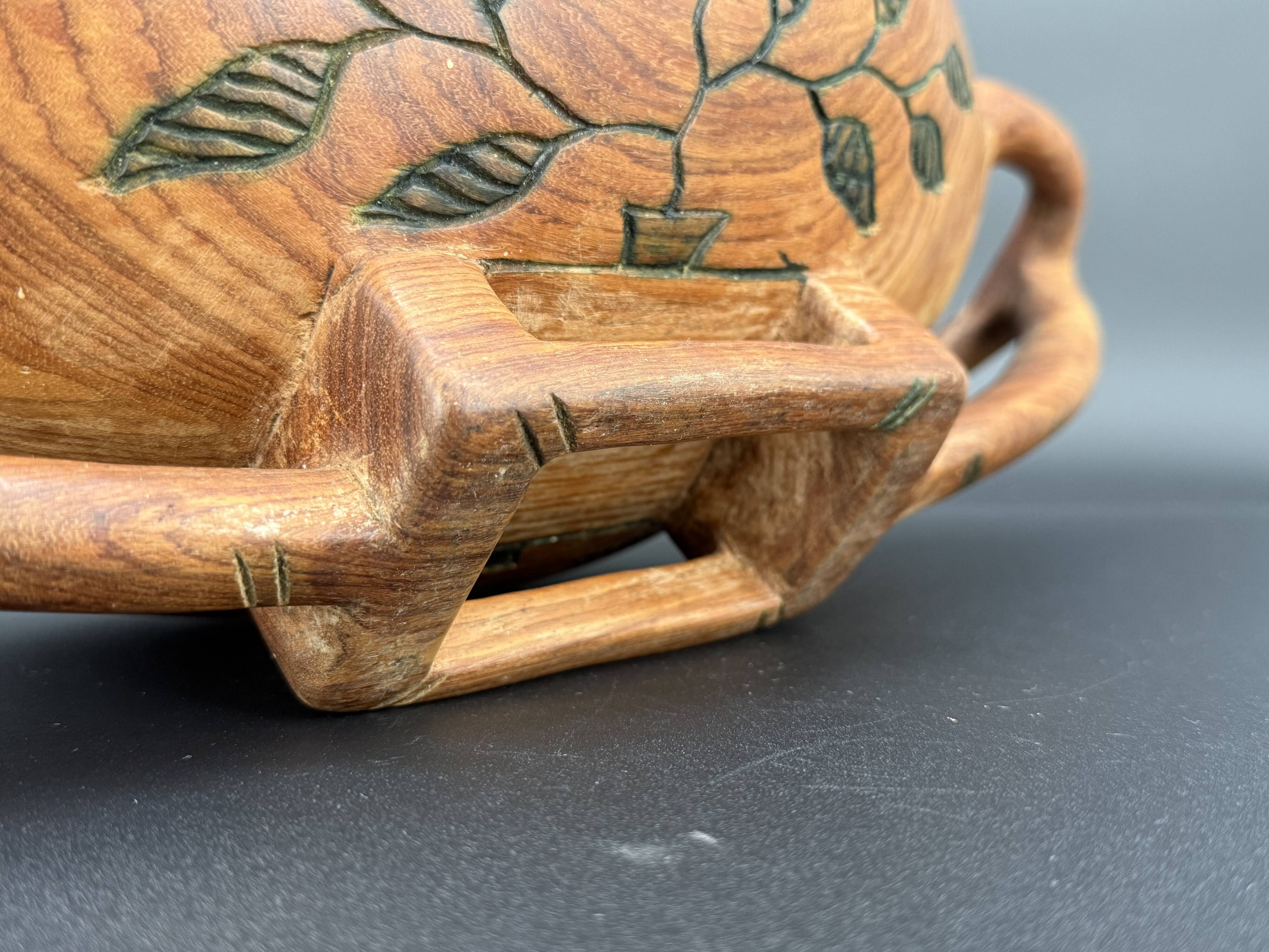 Carved cup in engraved wood – floral decoration and geometric handles