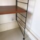 Self-supporting modular wall shelf