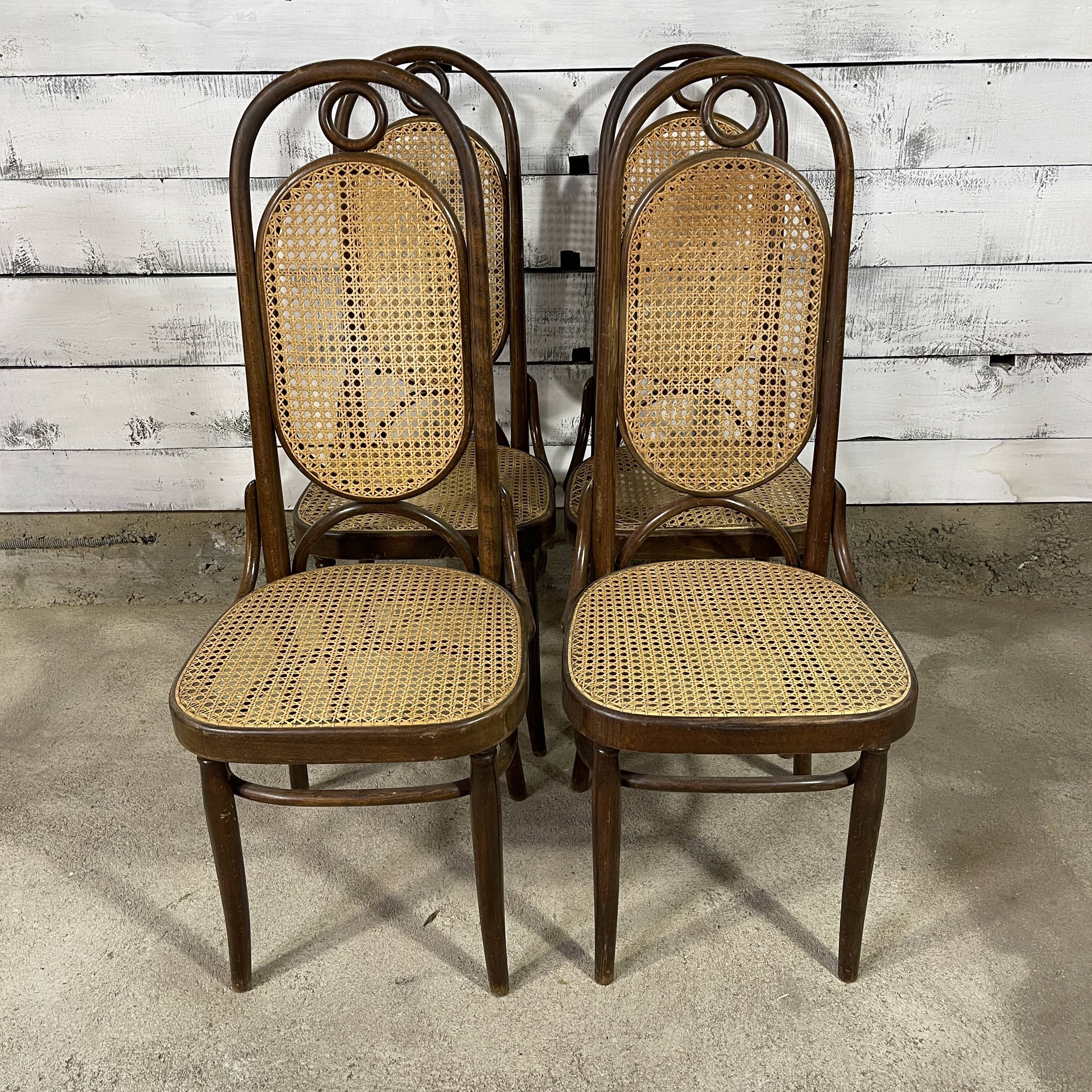 Series of 4 canned bistro chairs