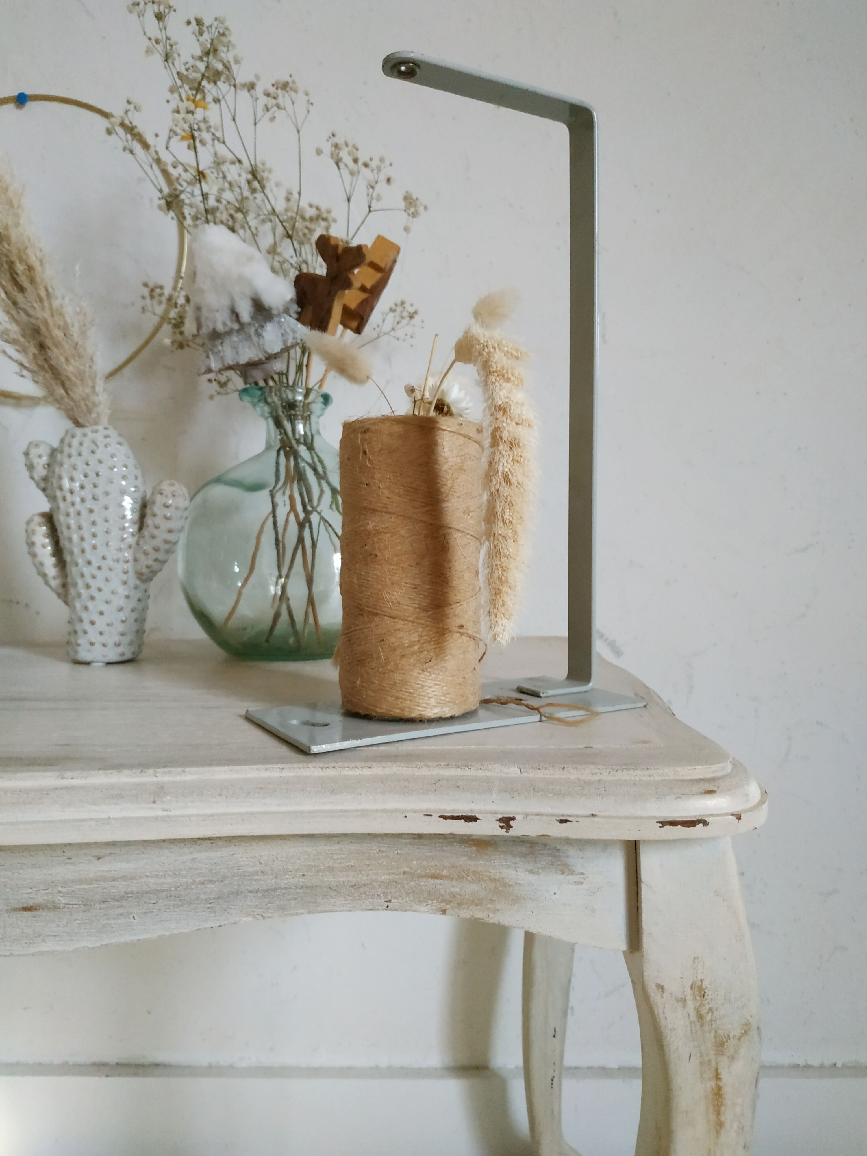Old patinated coffee table and curved feet