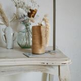 Old patinated coffee table and curved feet