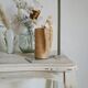 Old patinated coffee table and curved feet
