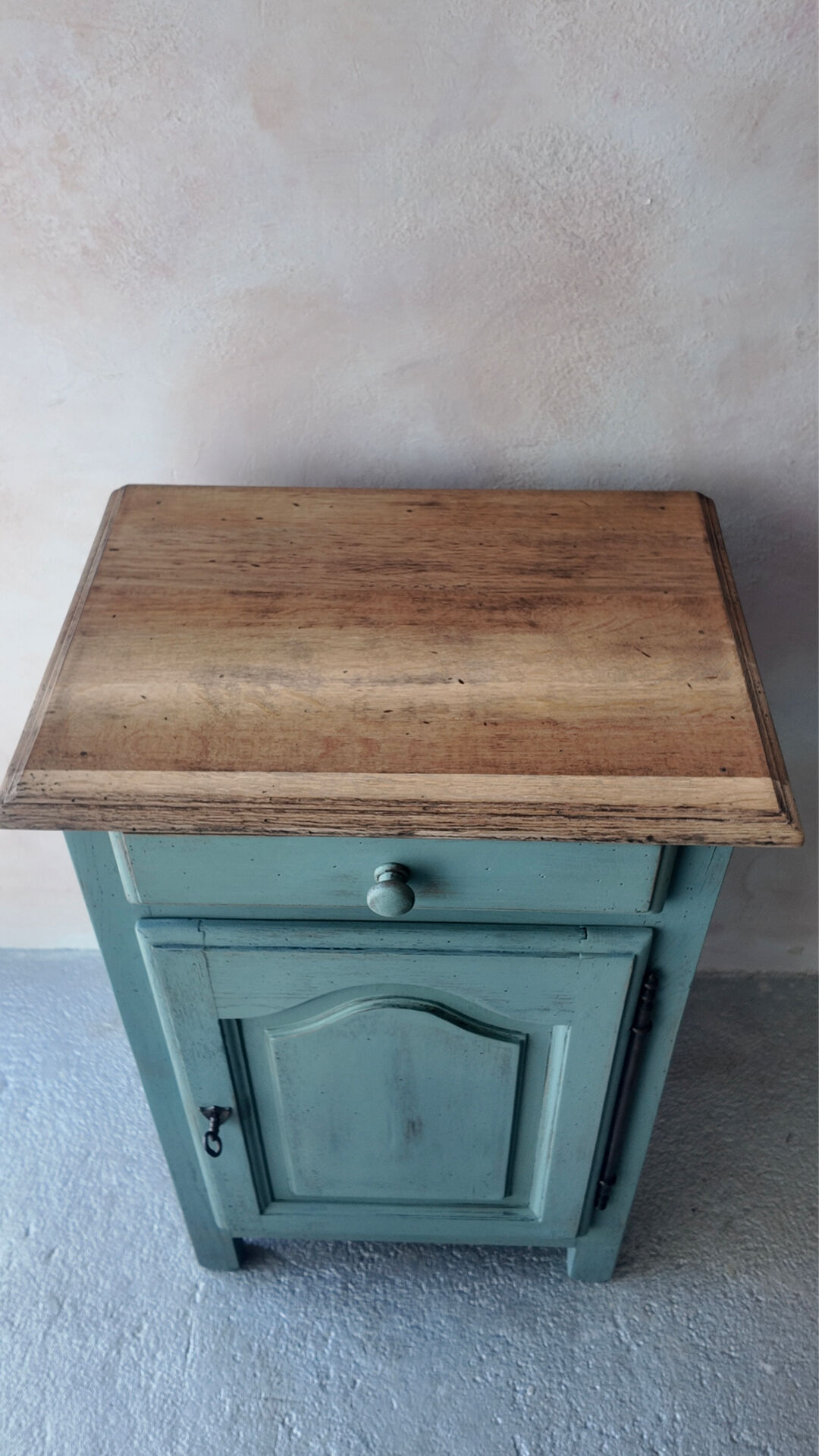 Small vintage side table in sage green patina and solid wood.
