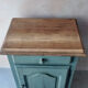 Small vintage side table in sage green patina and solid wood.