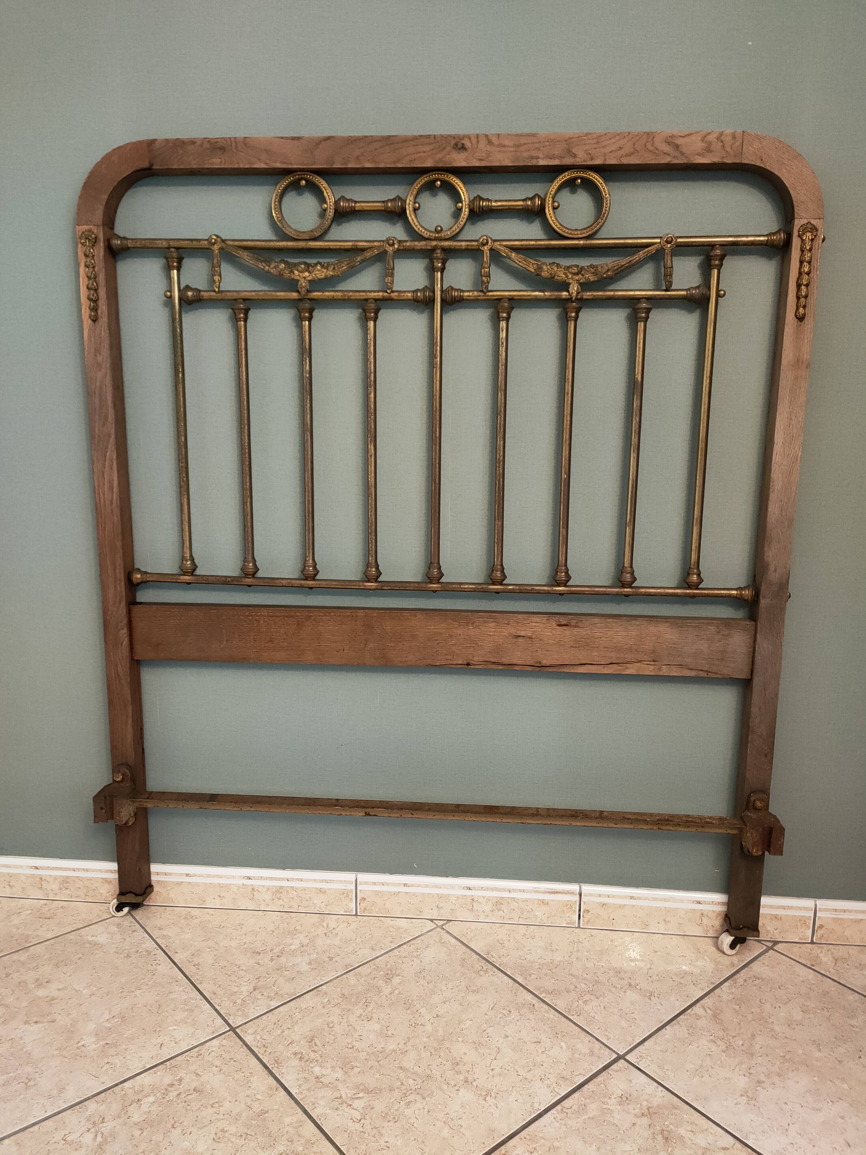 Oak and brass headboard from the 20s-30s
