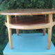 Round coffee table in solid walnut double tray of the 1970s