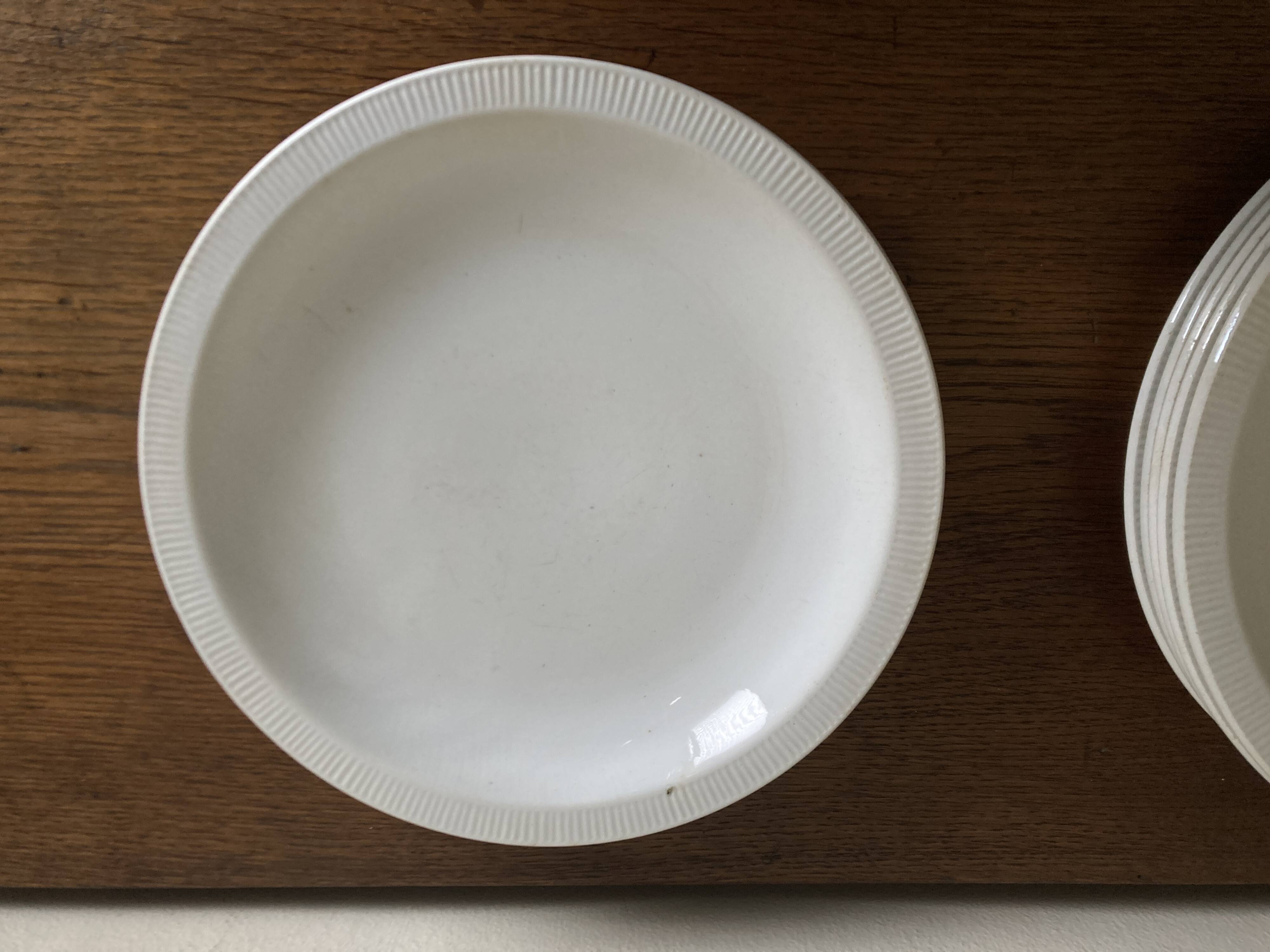 Set of 7 modernist flat plates Lunéville 1930 white earthenware