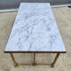 Hollywood Regency style coffee table • marble and brass