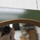 Unusual round wall mirror 60 cm teak edge on green rectangular board 1960.