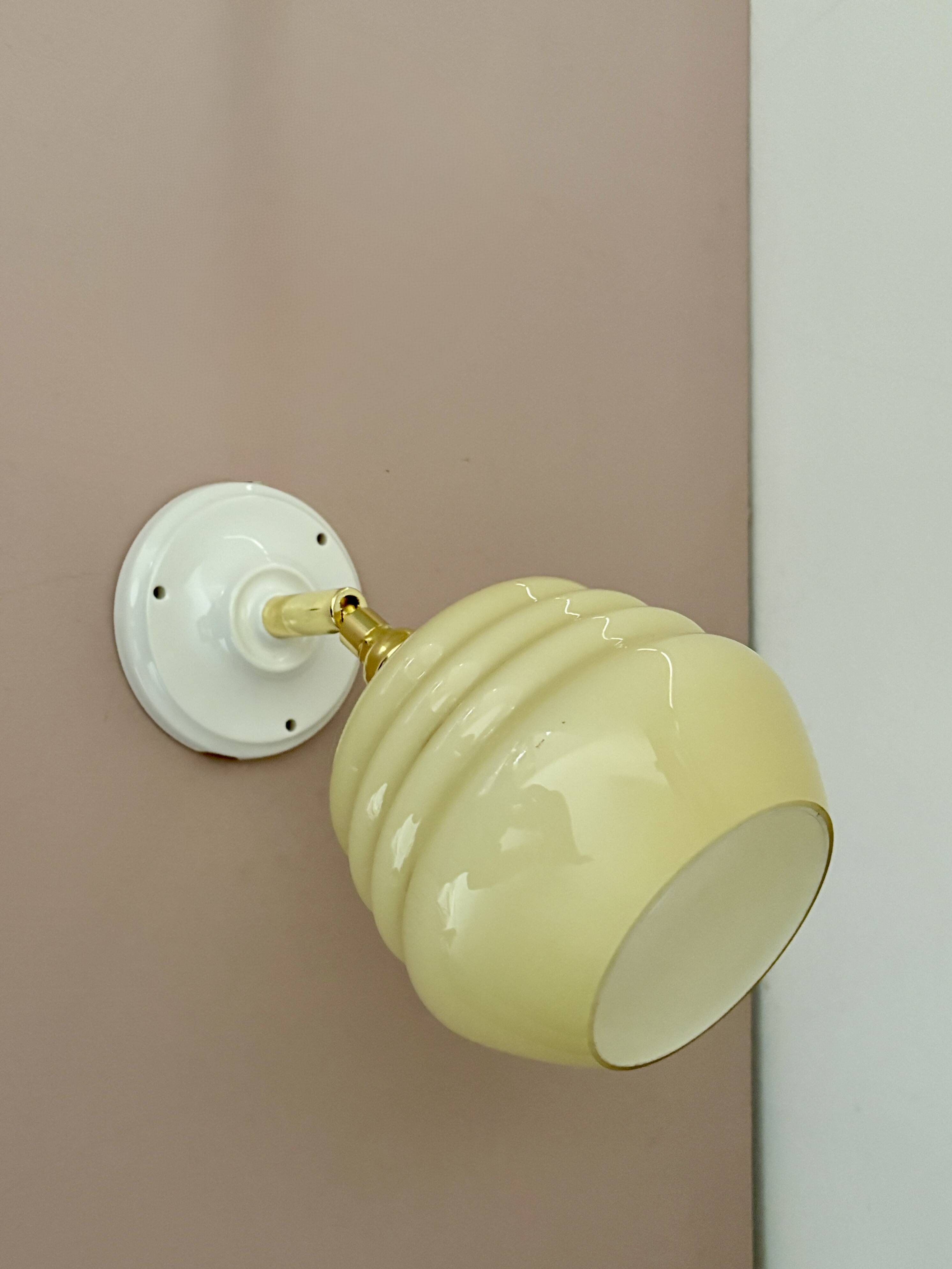 Vintage globe wall lamp in pale yellow opaline